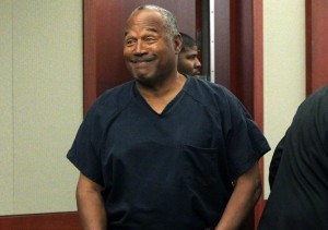 A grinning and overweight O. J. Simpson in court