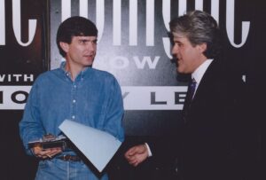 Joe Toplyn discusses a comedy piece with Jay Leno backstage at "The Tonight Show with Jay Leno" in February 1995