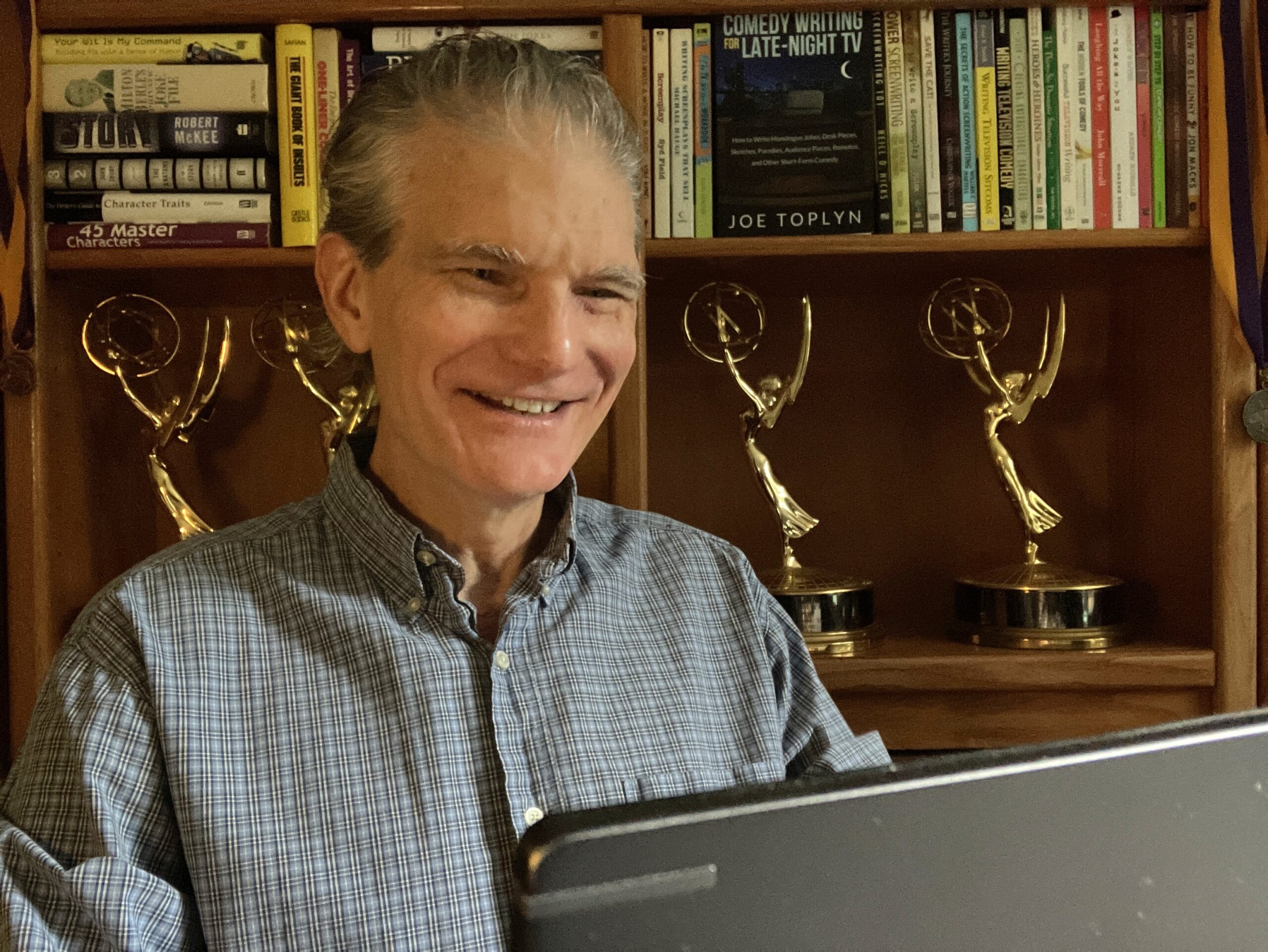 Joe Toplyn at his laptop
